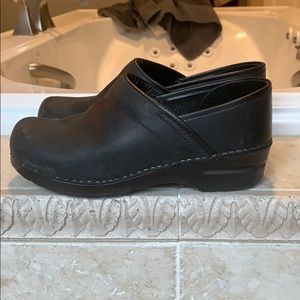 Sanita, slightly worn (maybe twice) black clogs.